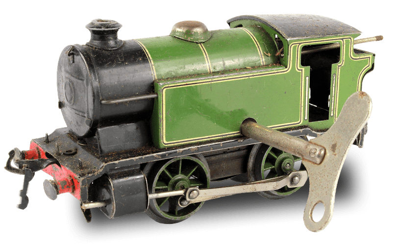 Green wind-up toy train with key.