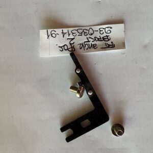 Metal bracket with attached small components and handwritten note.