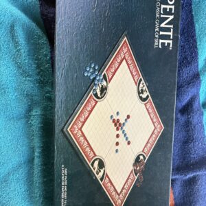 A Pente game board with four corner markers.